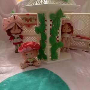 Vintage strawberry shortcake gazebo, and 3 dolls